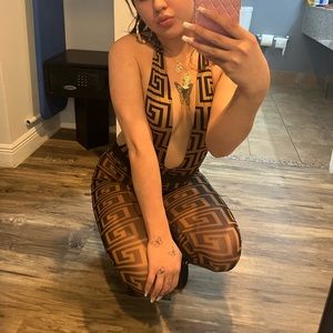 It’s a tan one piece for going out.